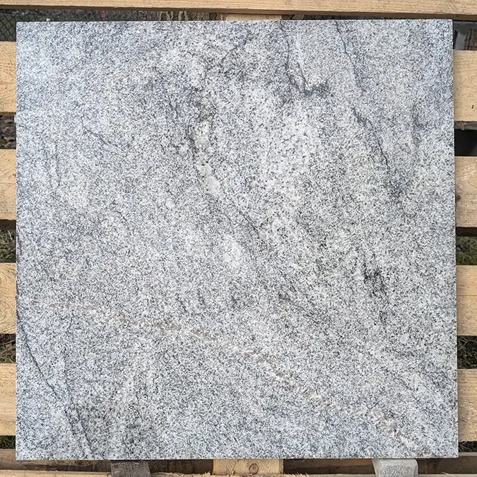 Light granite sample with veins